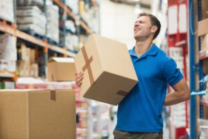 BACK PAIN WAREHOUSE WORKER iStock-Wavebreakmedia-470939108.jpg