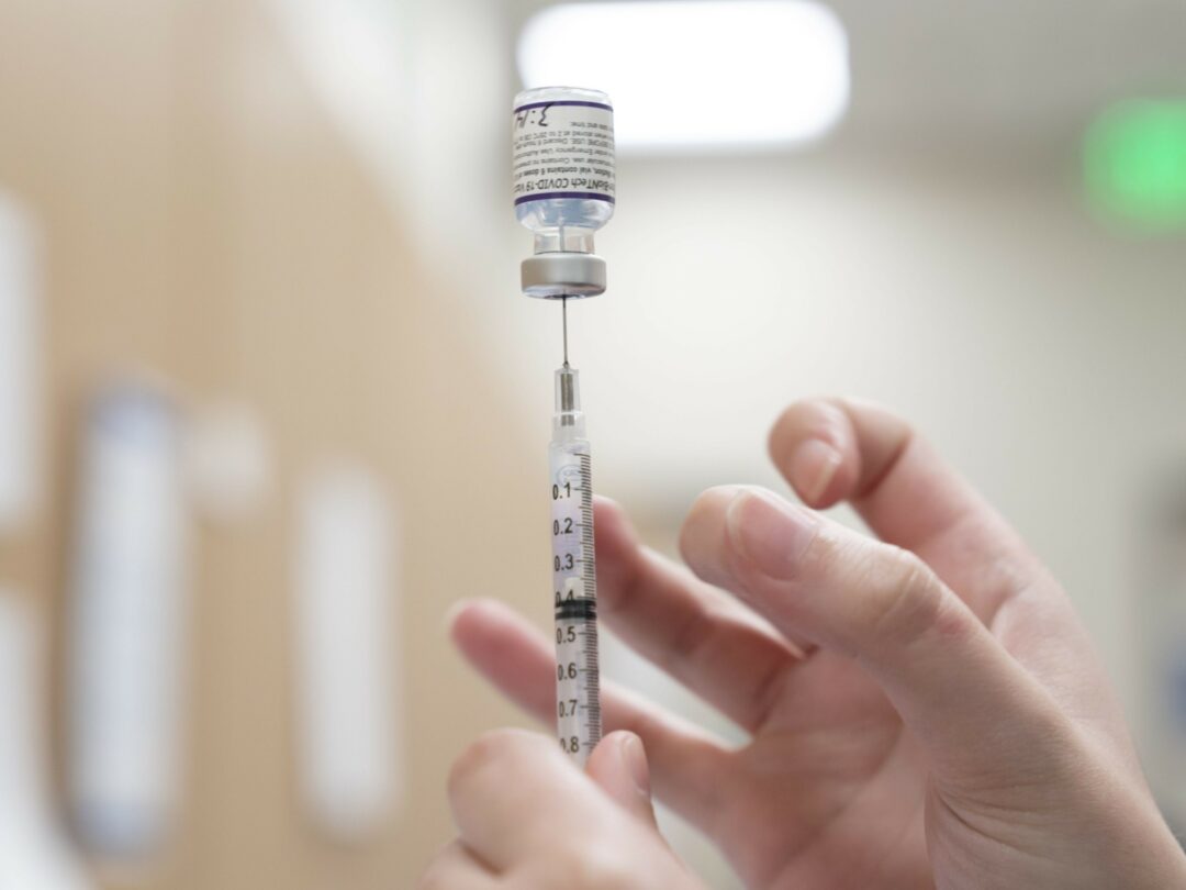 HYPODERMIC NEEDLE COVID VACCINE BLOOMBERG.jpg