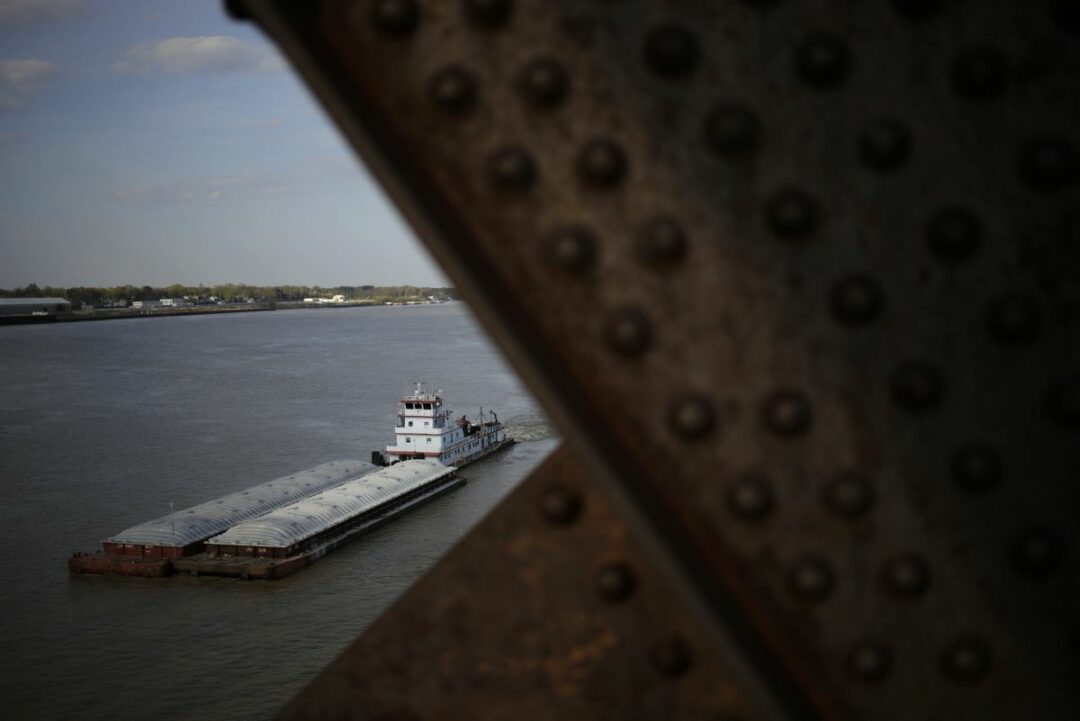 A BARGE ON A RIVER 