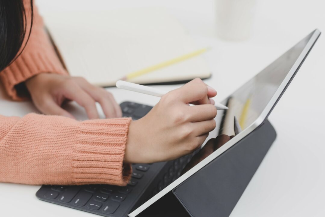 person-using-a black-laptop-computer