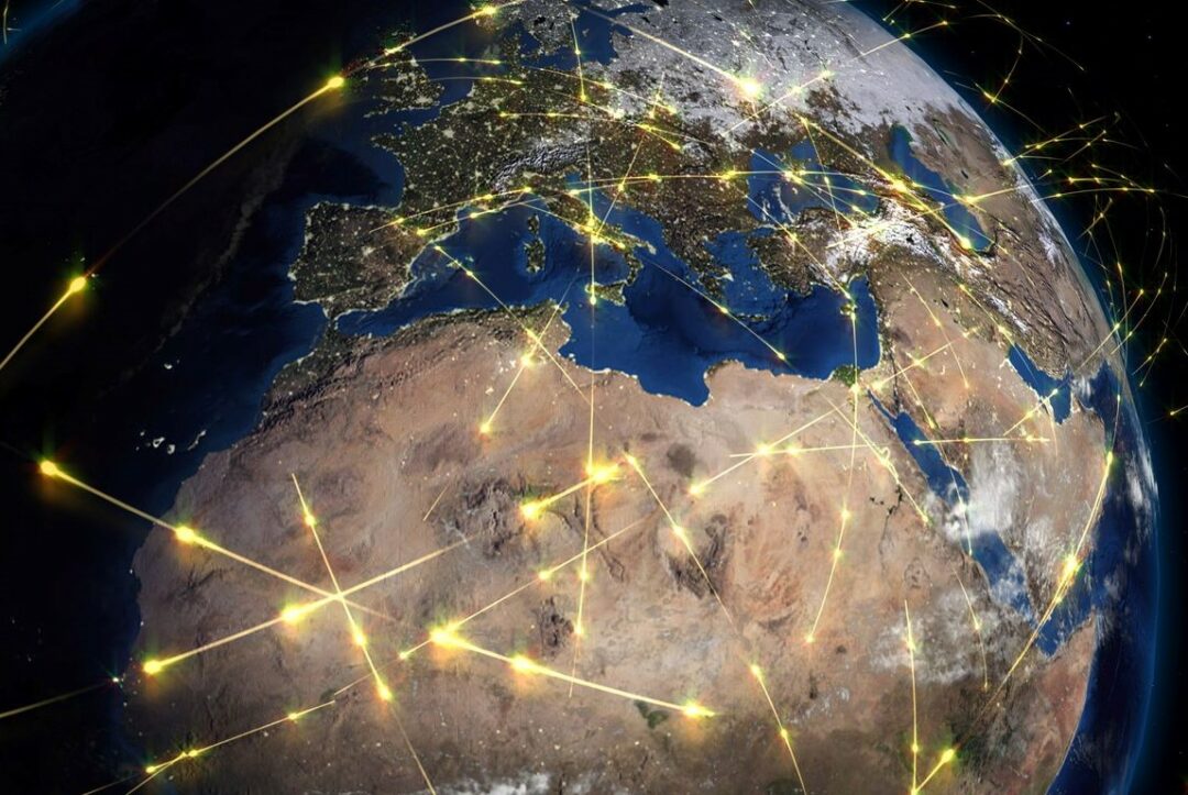 A GRAPHIC SHOWING BEAMS OF BRIGHT LIGHT SHOOTING ALL OVER THE SURFACE OF THE EARTH'S GLOBEpg