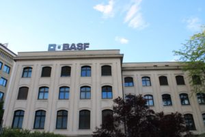 AN IMPOSING GRANITE OFFICE BUILDING BEARS THE BASF LOGO