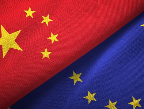 THE FLAGS OF CHINA AND THE EU ARE FOLDED NEXT TO ONE ANOTHER