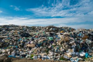 A GIANT PILE OF TRASH INCLUDES MANY PLASTIC BAGS