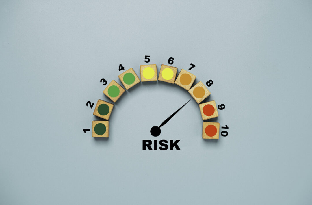 A RISK LEVEL INDICATOR IN A SEMI-CIRCLE IS LABELED ONE TO TEN. AN ARROW IS POINTING TO AN ORANGE BLOCK WITH THE NUMBER EIGHT ABOVE IT.