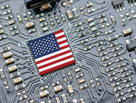 AN AMERICAN FLAG IS EMBEDDED ON COMPUTER PROCESSOR.