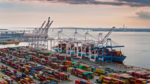 Containers and cranes along the water at the Port of Baltimore