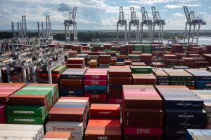 Shipping containers stacked in a port