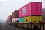 A freight rail train with containers