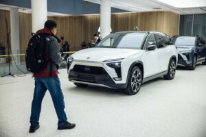 An EV on a showroom floor.