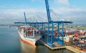 A container ship with cargo docked at the Port of Charleston