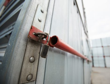 A broken lock on a cargo container