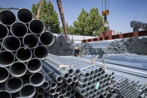 A stack of steel cylinders in a yard