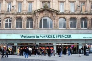 A GRAND ORNATE STORE FRONT BEARS THE WORDING WELCOME TO MARKS & SPENCER