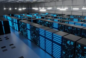 ROWS OF GLOWING DATA STORAGE STACKS SIT IN A DATA CENTER