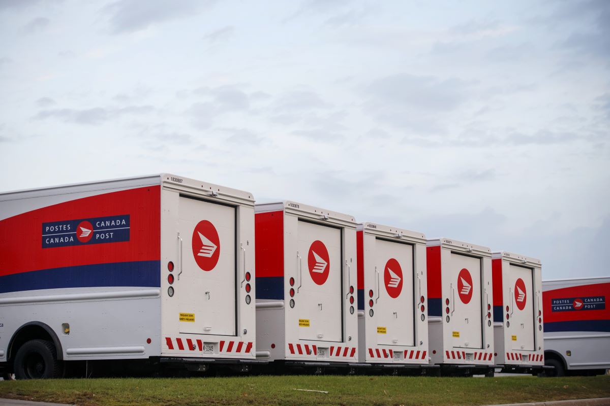 Canada post trucks bloomberg