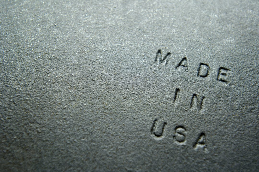 A grey slab of steel with "Made in USA" printed along the lower right corner