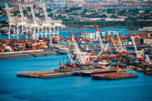 Aerial view of loading piers with hoist cranes on docks