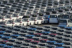 A SEA OF CARS LINED UP IN ORDER OF COLOR